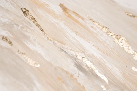 Christmas elegant background. Blurred abstract art gold foil backdrop. Luxury glamorous shiny festive soft wallpaper. Stylish, trendy and posh abstraction. Chic feminine neutral nude beige background.の写真素材