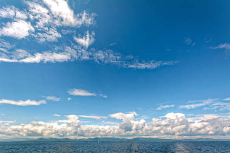 Beautiful sky with clouds  at Lake Champlainの写真素材