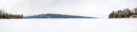 Panoramic view of winter frozen lake