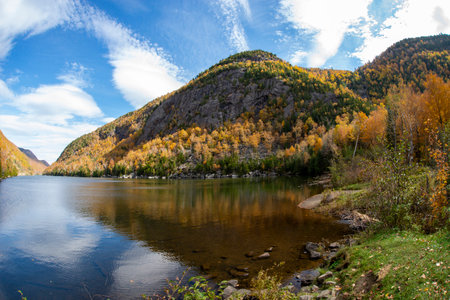 Beautiful autumn landscape with colorful forest and lake. in the Adirondack mountainsの写真素材