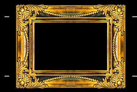 gold picture frame isolated on black background.