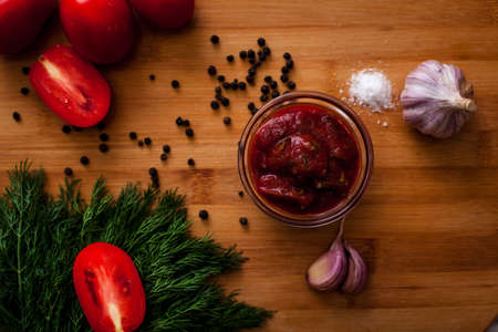 sauce tomato spices peper garlic green redの写真素材