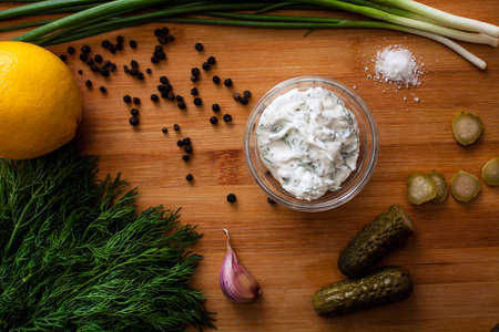 sauce mayonnaise spices peper garlic green lemonの写真素材