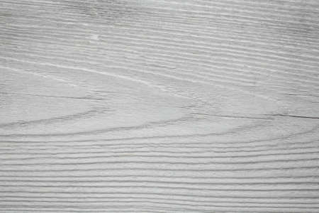old, whitewashed, wooden board as a backgroundの写真素材