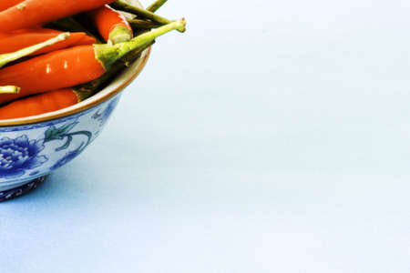 Red hot chili peppers in a bowlの写真素材