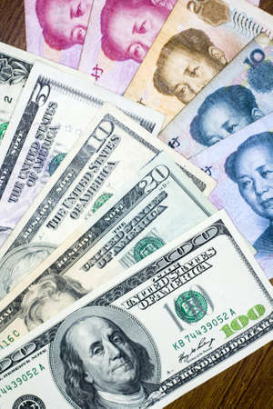 US dollar vs Chinese RMB - tug-of-war of currency depreciation and appreciation の写真素材