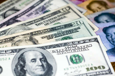 US dollar vs Chinese RMB - tug-of-war of currency depreciation and appreciation の写真素材