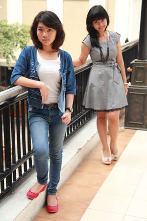 two beautiful smiling young girlsの写真素材