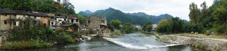 River beside the houseの写真素材