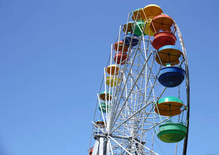 Ferris Wheel Over Blue Sky
