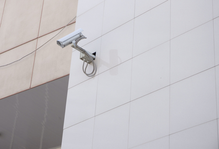 Security cameras on wallの写真素材