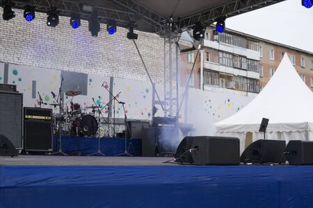 musical instruments on stage in a concert hallの写真素材