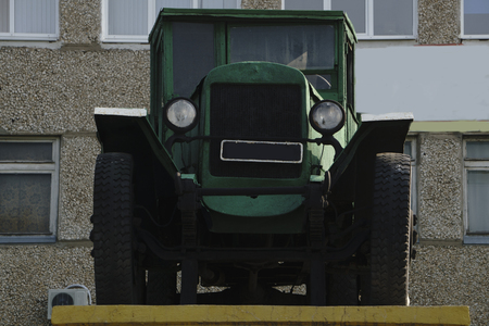 Retro lorry truck. Green color, down side. Body, silver exhaust pipe, car wheelの写真素材