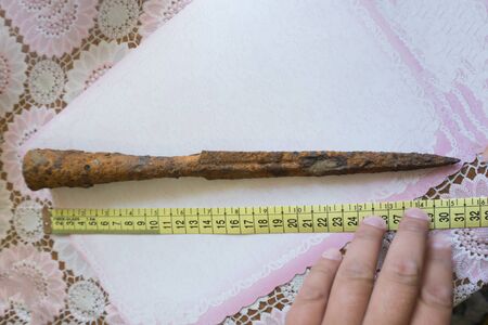 Ancient rusty spear tipの写真素材