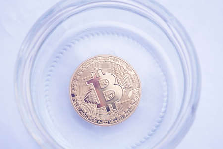 bitcoin in a jar. saving money conceptの写真素材