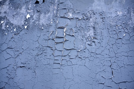 cracks in the dark gray paintの写真素材