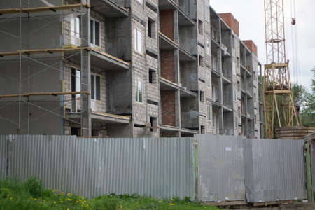 Crane and building construction siteの写真素材