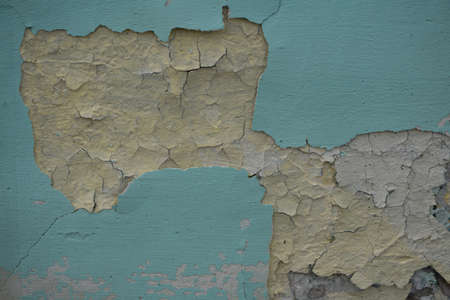 Close up paint layers, many paint and paper layers give an Abstract texture, macro of flake off...
