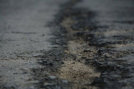 cracked asphalt after earthquakeの写真素材