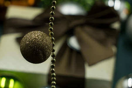 brown Christmas ball with giftの写真素材