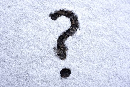 The Question mark on the snow auto windowの写真素材