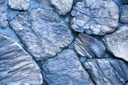 Mani stones are stone plates, rocks or pebbles as a formの写真素材