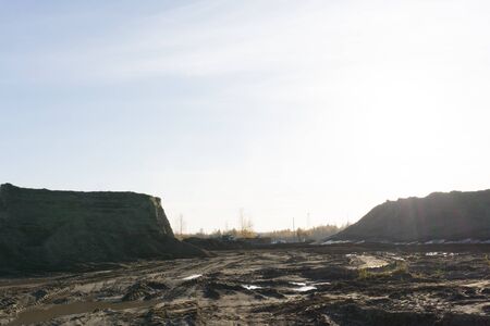 Criminal quarry for the extraction of clay and sand. Industrial quarry sand and clay barbaric method.の写真素材