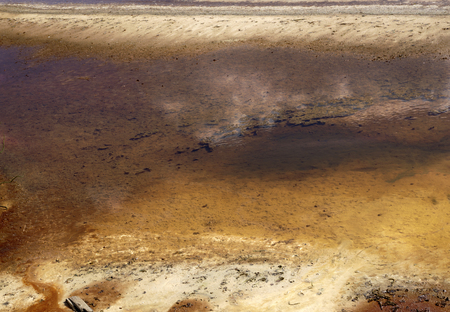 Dirty water discharged into riverの写真素材