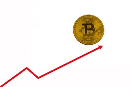 Bitcoin value growth showed white growth arrow and candlestick chart.copy space for textの写真素材