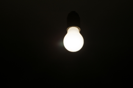 Included pendant Lamp light bulb on black backgroundの写真素材