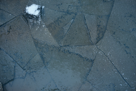 ice background texture. Melting ice with different shapes and cracksの写真素材