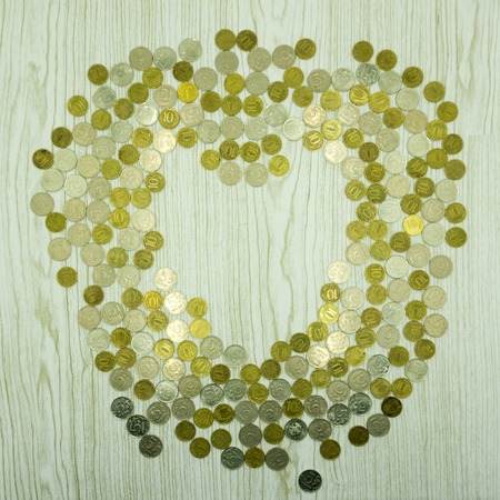 Coins in a Heart Shaped Cookie Cutter