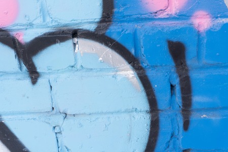 Modern Street Art Horizontal Background Or Texture. Grunge Brick Wall With Graffiti Art. Urban Surface With Grafiti. Old Building Brickwall With Modern Street Grafitti Art Fragmentの写真素材