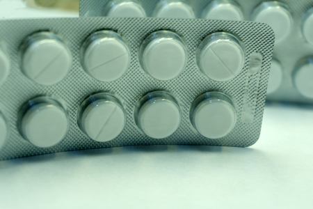 Tablets in blisters on a white backgroundの写真素材