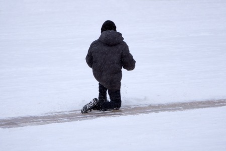 Young Girl Falls Learning to Skateの写真素材