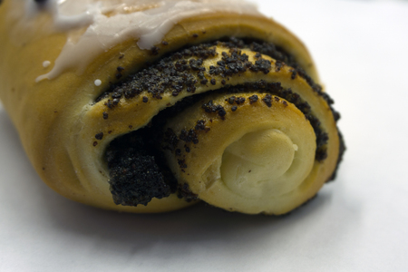 Top view studio shot of a heart shaped collection of different delicious freshly baked loafs of bread isolated on white food love nutrition healthy conceptの写真素材