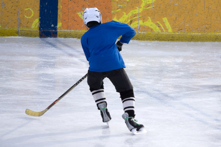 Little Boy Hockey Player. Isolated on white background