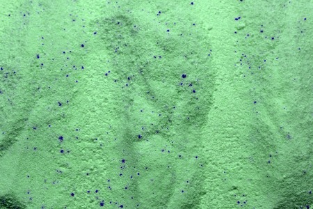 washing liquid and detergent powder with bamboo clothes pins on white woodenの写真素材