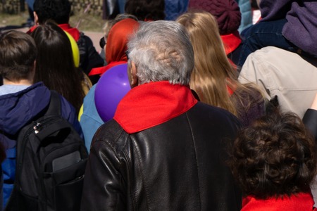 a crowd of people at the station waiting for the year passenger