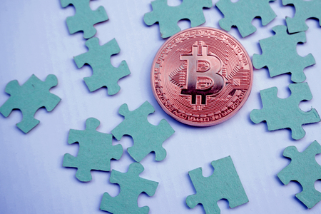 gold bitcoin and puzzlesの写真素材