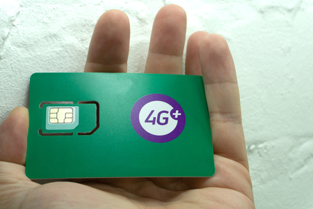 mobile phone sim card on a white background .