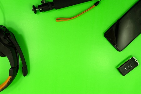 On the white table are the objects. the theme of the summer . gadget , phone is on the table, the sea shells . background on a theme vacation .の写真素材