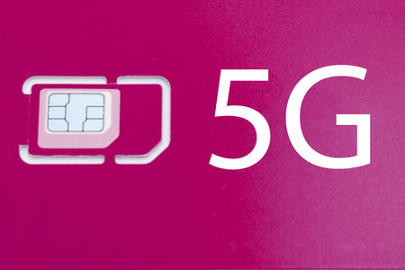 mobile phone sim card on a white background 5G .の写真素材