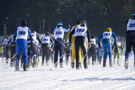Mass start race, ski mountaineers climb to mountain on skis. Individual race ski mountaineering Asian, and Championship.の写真素材