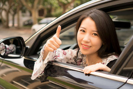 asian girl in car