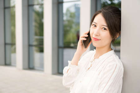 office lady talking on the phoneの写真素材