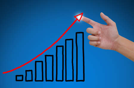 hand pointing showing graph.の写真素材