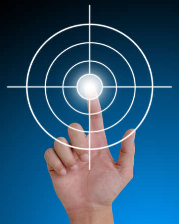 hand pushing a button on a touch screen interface.の写真素材