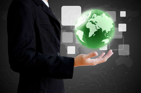 hand holding the world and buttonsの写真素材