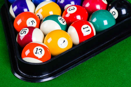 billiard balls on green tableの写真素材